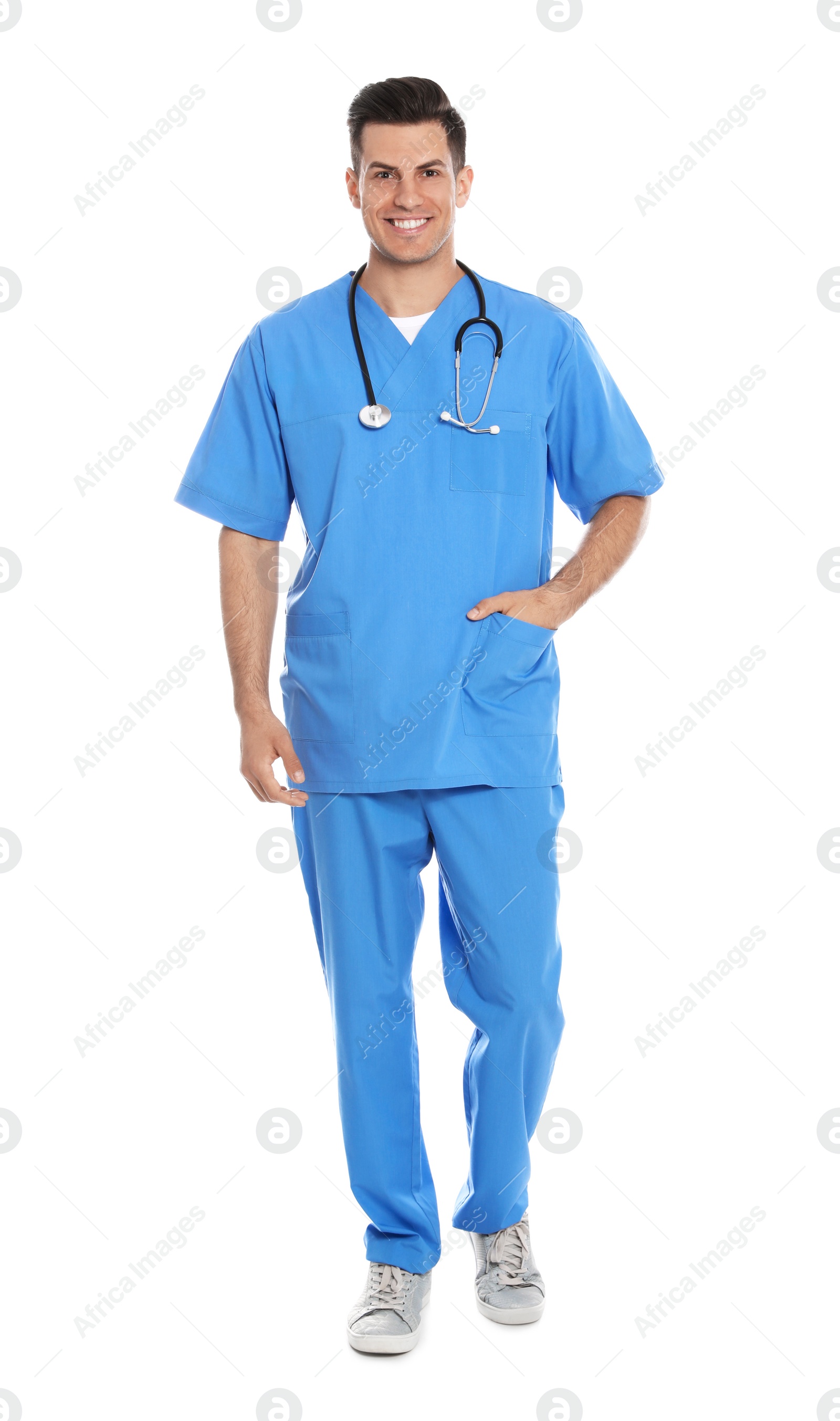 Photo of Full length portrait of medical doctor with stethoscope isolated on white