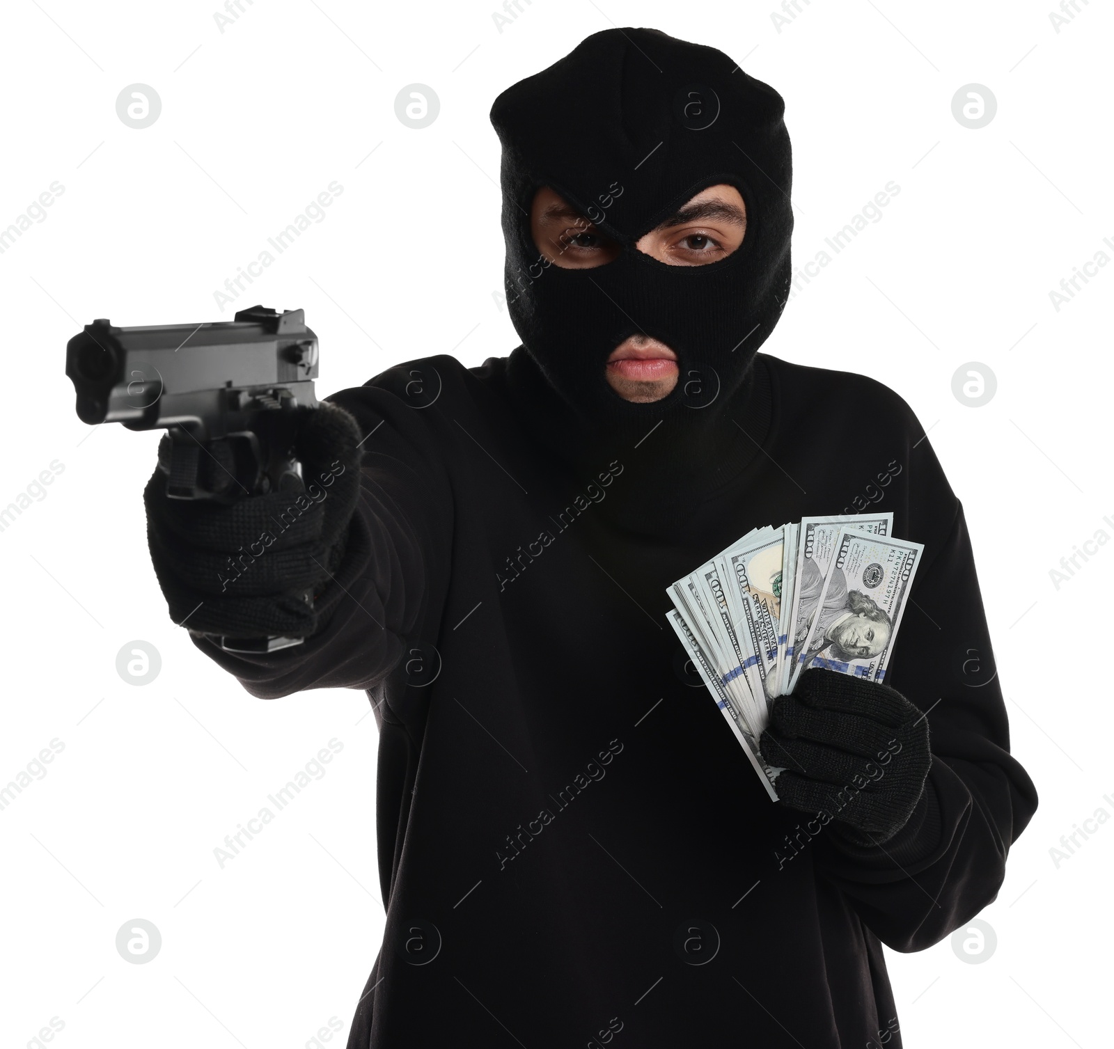 Photo of Thief in balaclava with gun and money on white background