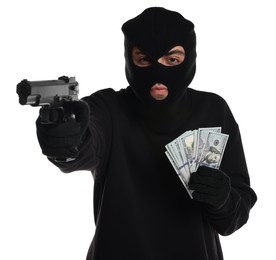 Thief in balaclava with gun and money on white background