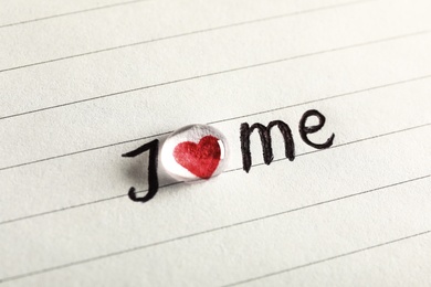 Photo of Phrase I Love Me written on paper, closeup view