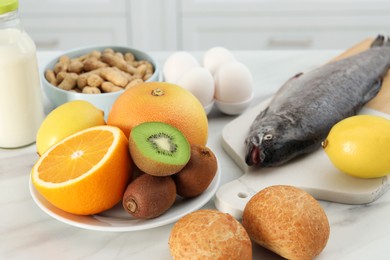 Photo of Allergenic food. Different fresh products on light table, closeup