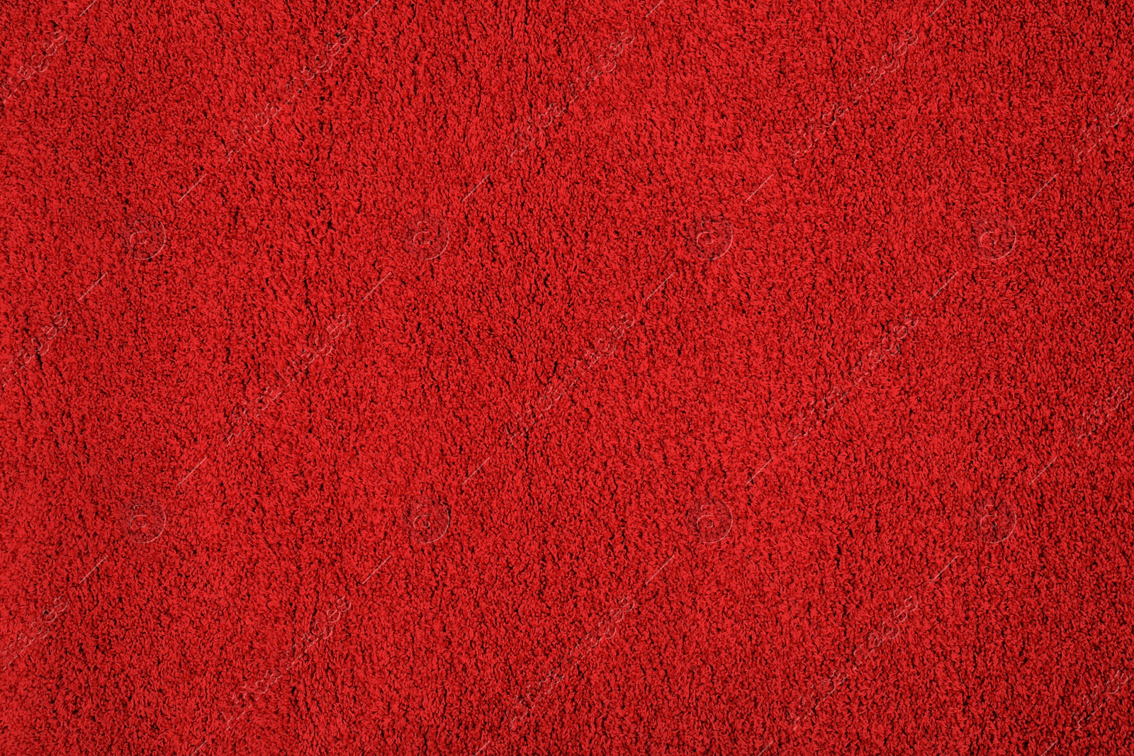 Image of Soft red carpet as background, top view