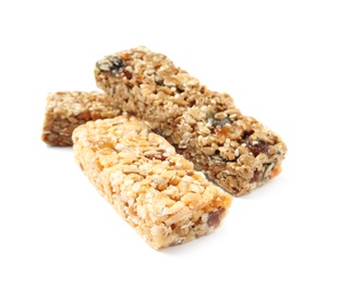 Different grain cereal bars on white background. Healthy snack