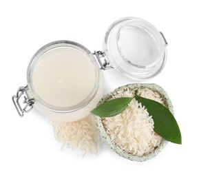 Photo of Homemade natural rice water and grains on white background, top view