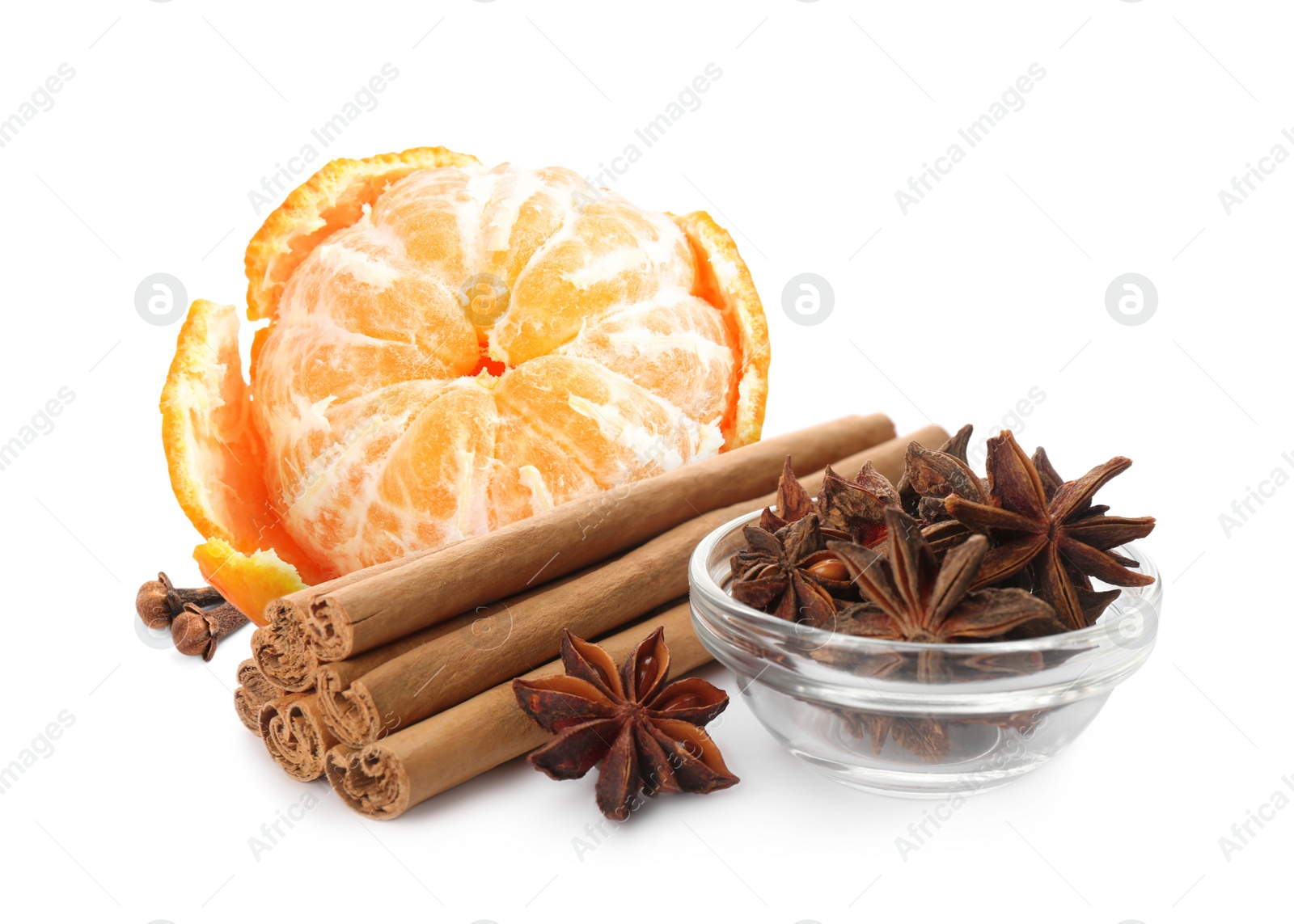 Image of Fresh ripe tangerine, cloves, anises and cinnamon on white background