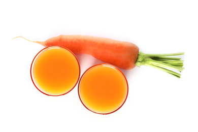 Photo of Freshly made carrot juice on white background, top view