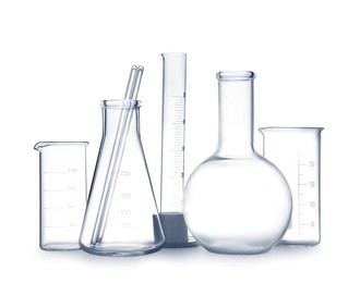 Empty clean laboratory glassware on white background