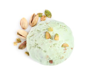 Photo of Scoop of delicious ice cream with pistachio nuts on white background, top view