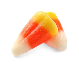 Photo of Colorful candy corns for Halloween party on white background