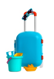 Photo of Stylish little blue suitcase with sunglasses and toys on white background