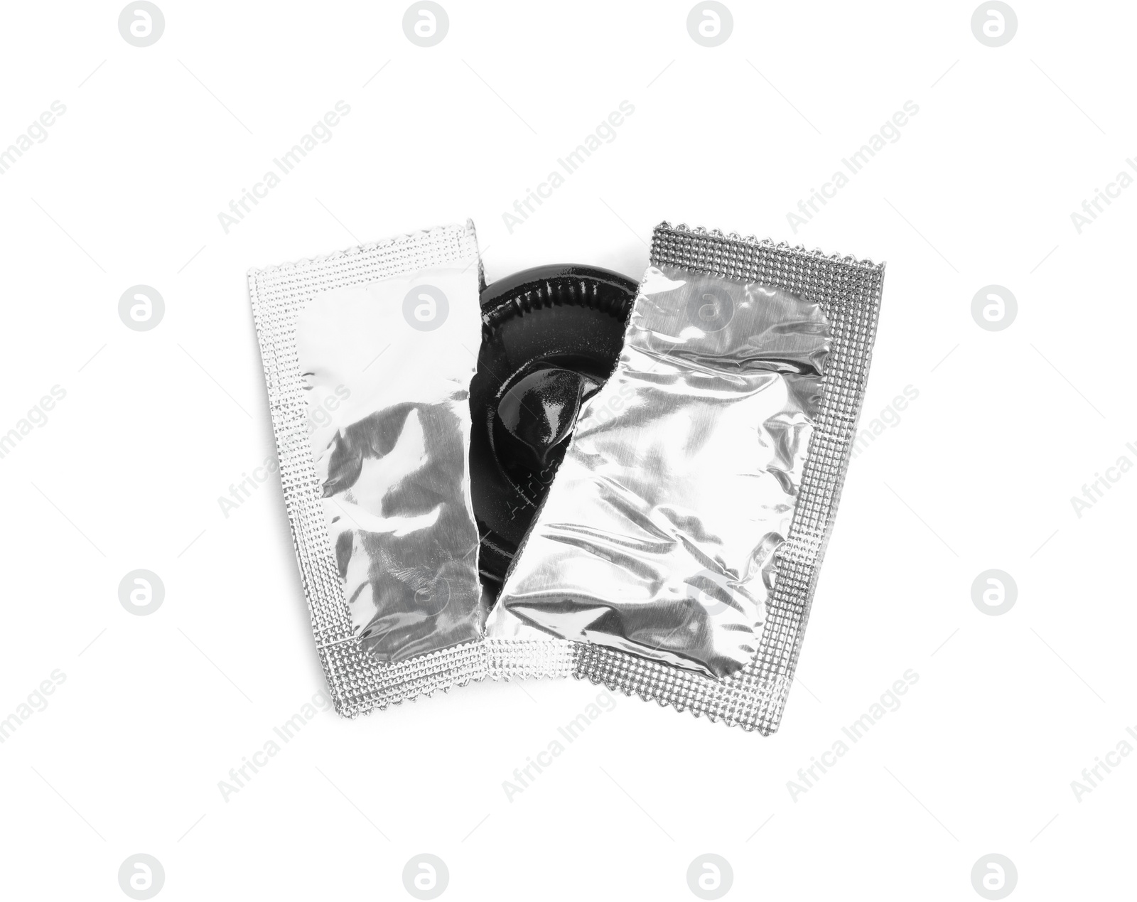 Photo of Torn condom package isolated on white, top view. Safe sex