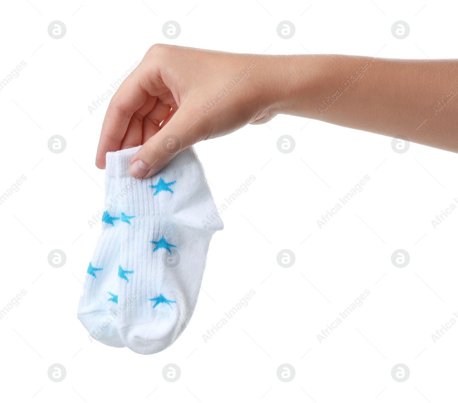 Photo of Woman holding pair of cute child socks on white background, closeup