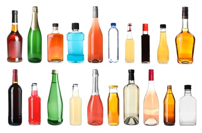 Image of Set of bottles with different liquids on white background 
