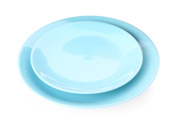 Photo of Empty clean ceramic dishware isolated on white