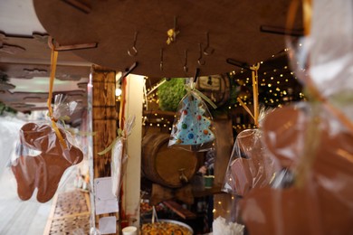 Photo of Gingerbread cookies hanging in Christmas fair stall