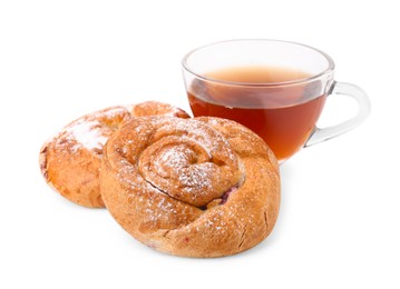 Photo of Delicious rolls with jam, powdered sugar and cup of tea isolated on white. Sweet buns