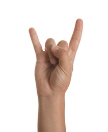 Photo of Teenage boy showing rock gesture on white background, closeup