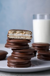 Photo of Stack of tasty choco pies on grey table