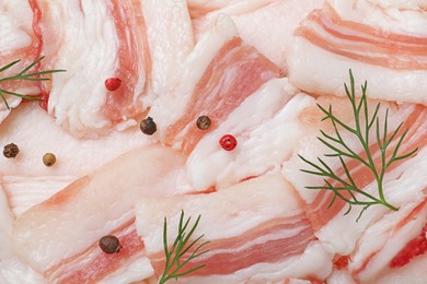 Photo of Tasty salt pork with peppercorns and dill, top view