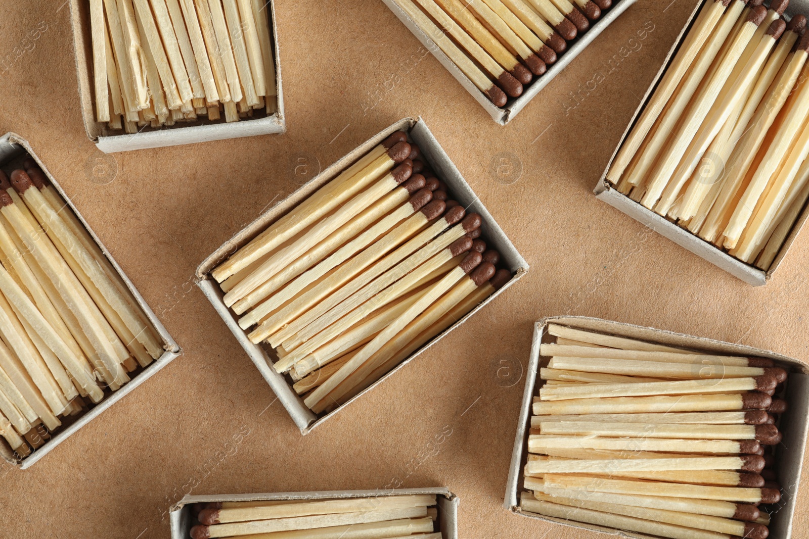 Photo of Flat lay composition with matches on craft paper