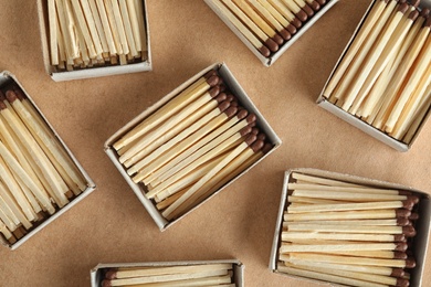 Photo of Flat lay composition with matches on craft paper