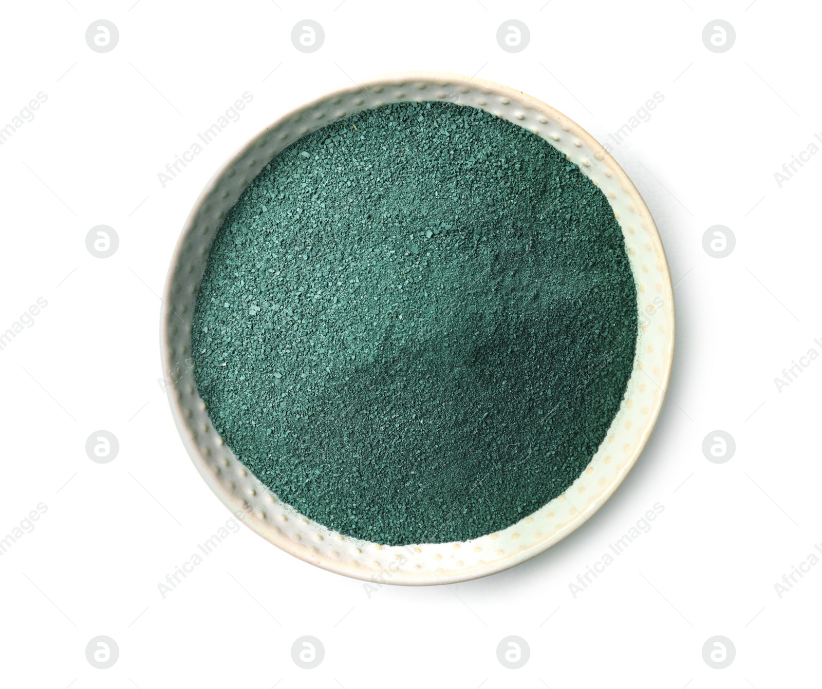 Photo of Bowl of spirulina algae powder isolated on white, top view