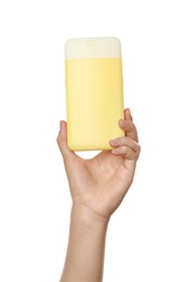 Woman holding plastic bottle of cosmetic product on white background, closeup