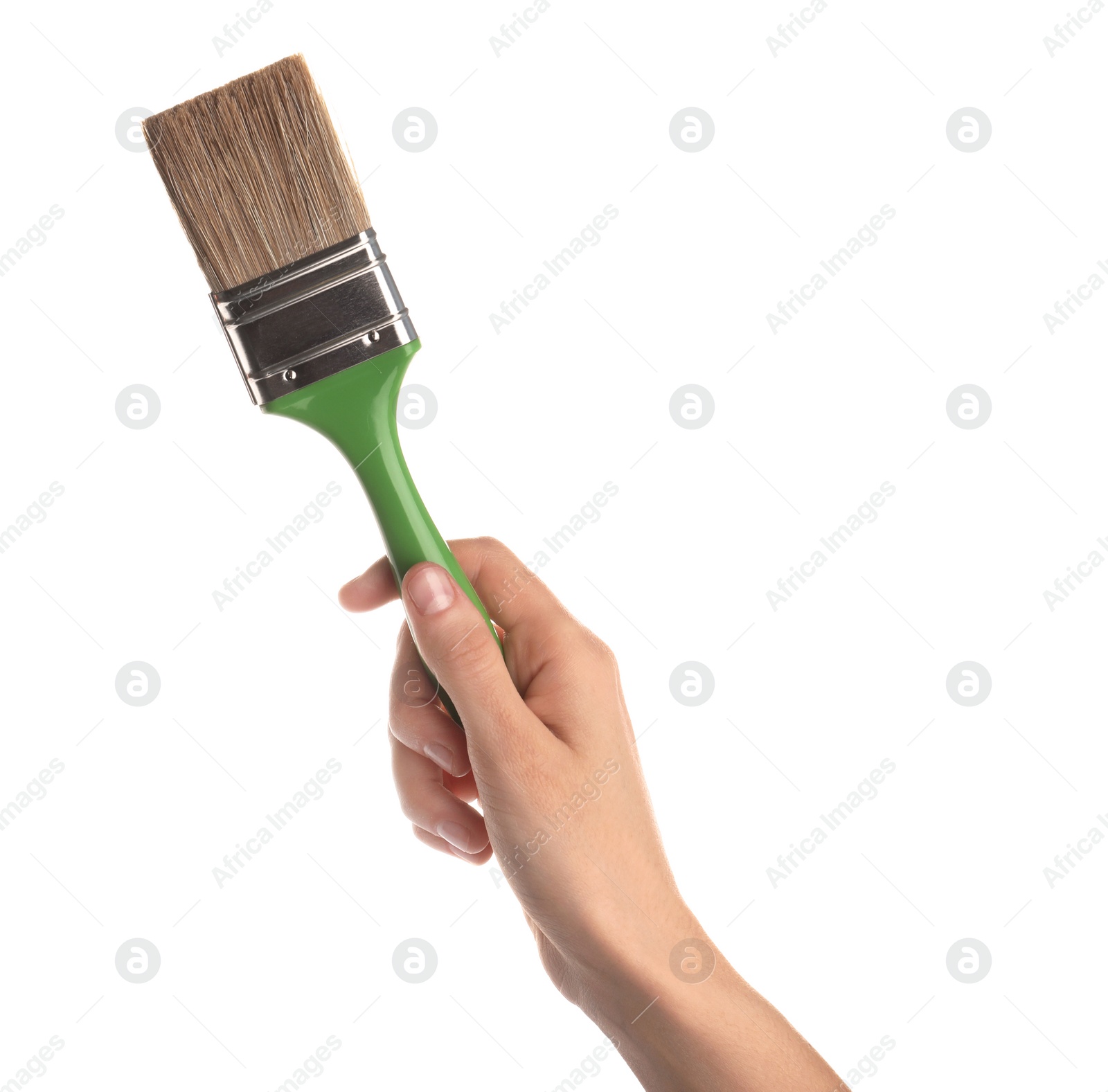 Photo of Woman holding paint brush on white background, closeup