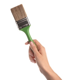 Woman holding paint brush on white background, closeup