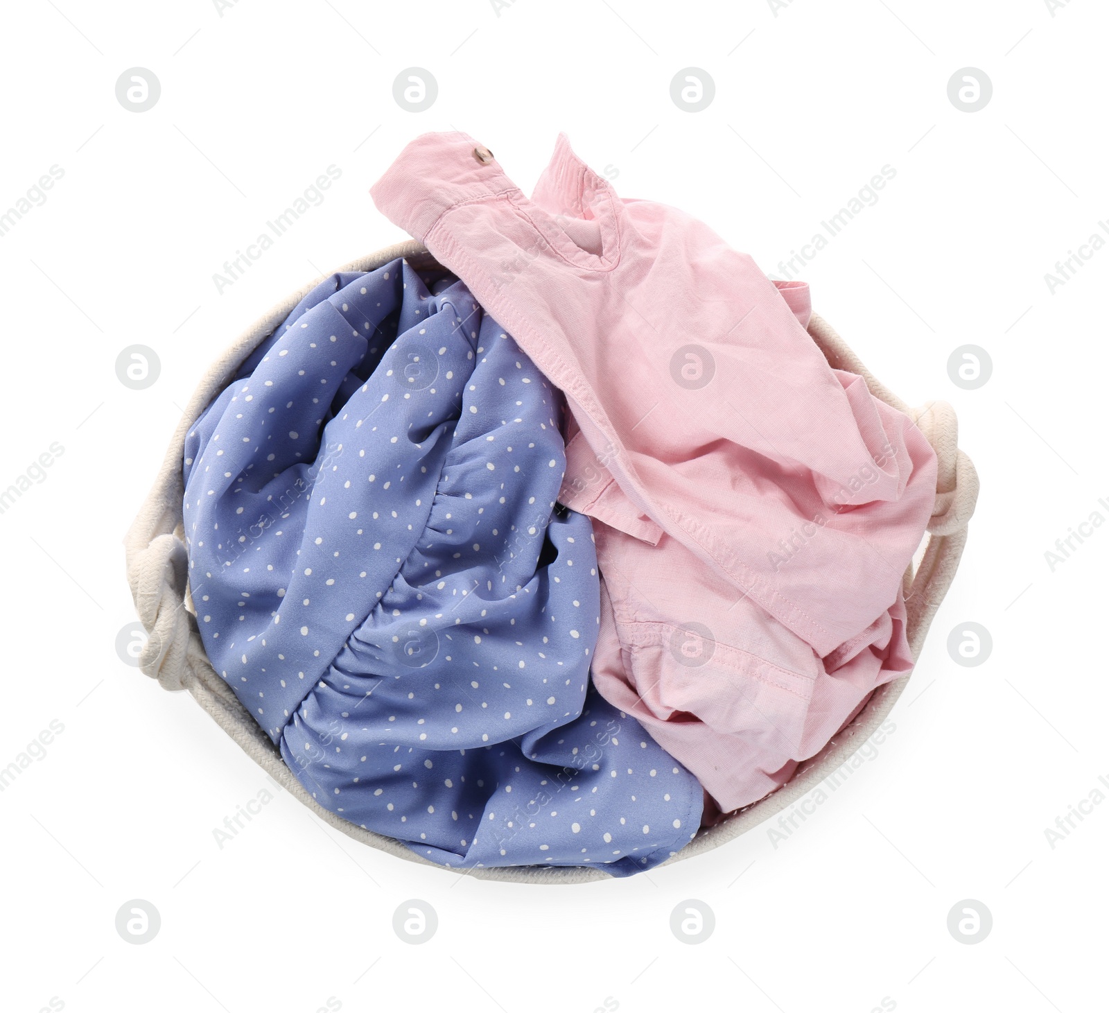 Photo of Wicker laundry basket full of clothes isolated on white, top view