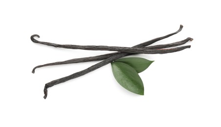 Aromatic vanilla pods and leaves isolated on white, top view