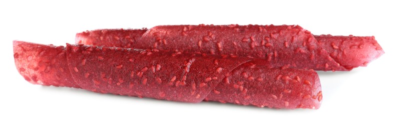 Photo of Delicious fruit leather rolls on white background