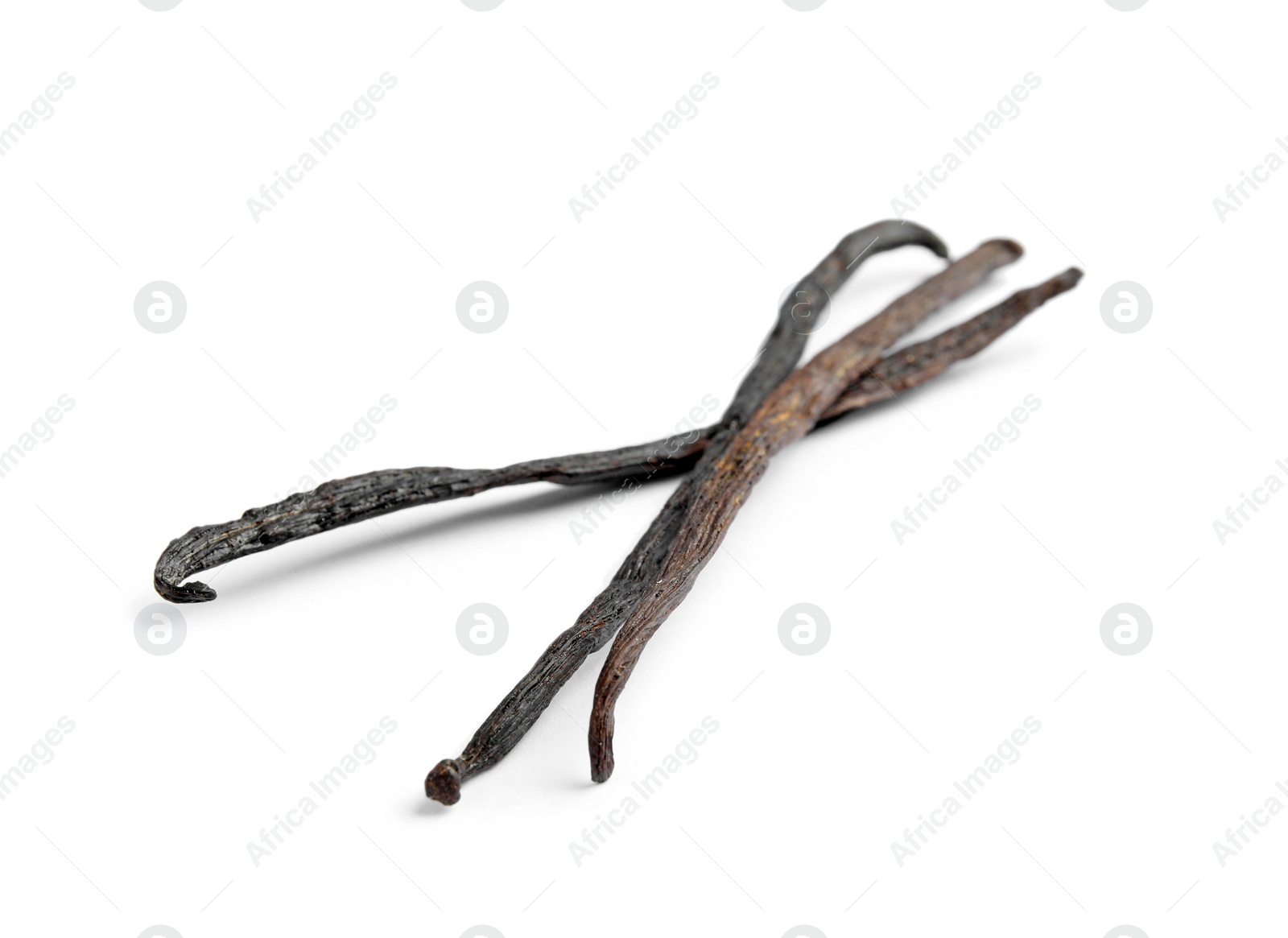 Photo of Dried aromatic vanilla sticks on white background