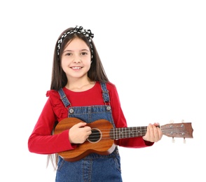 Portrait of little girl playing guitar, isolated on white