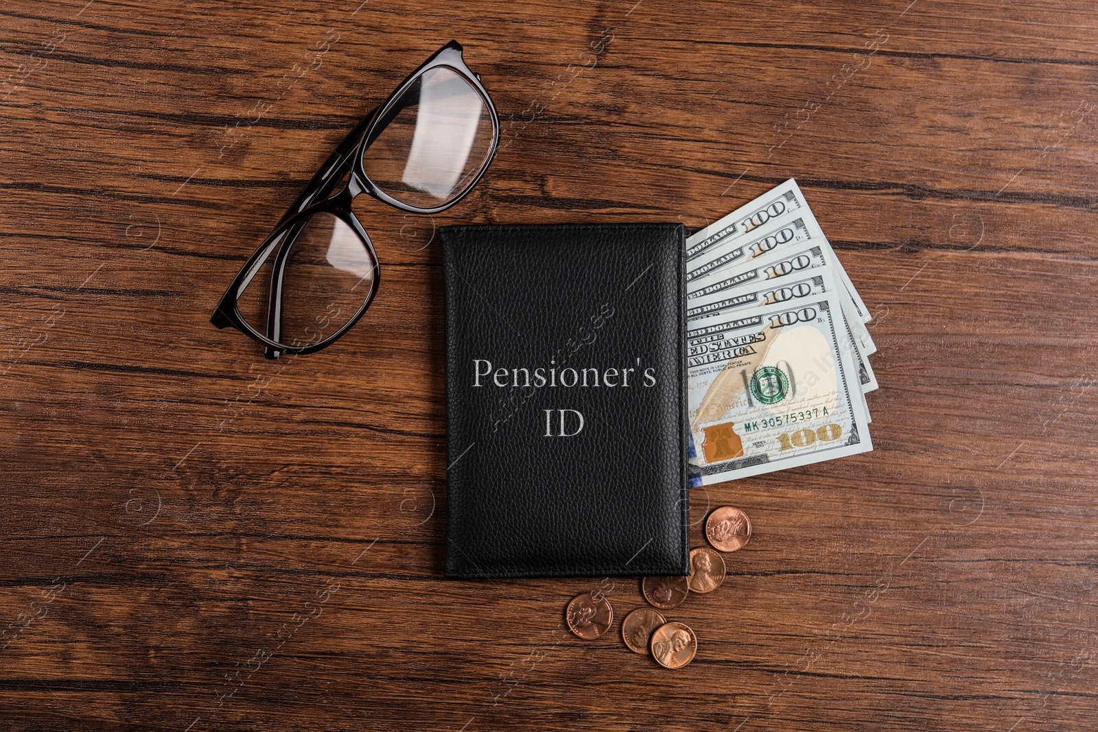 Photo of Pension certificate with American money and glasses on wooden table, flat lay