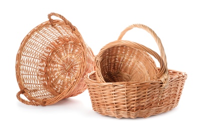 Three decorative wicker baskets on white background