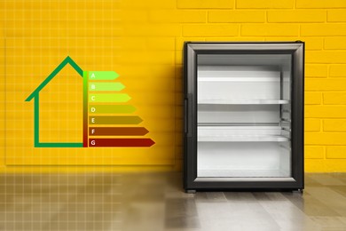 Image of Energy efficiency rating label and refrigerator indoors