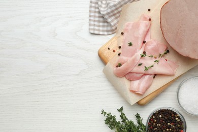 Photo of Delicious ham on white wooden table, flat lay. Space for text