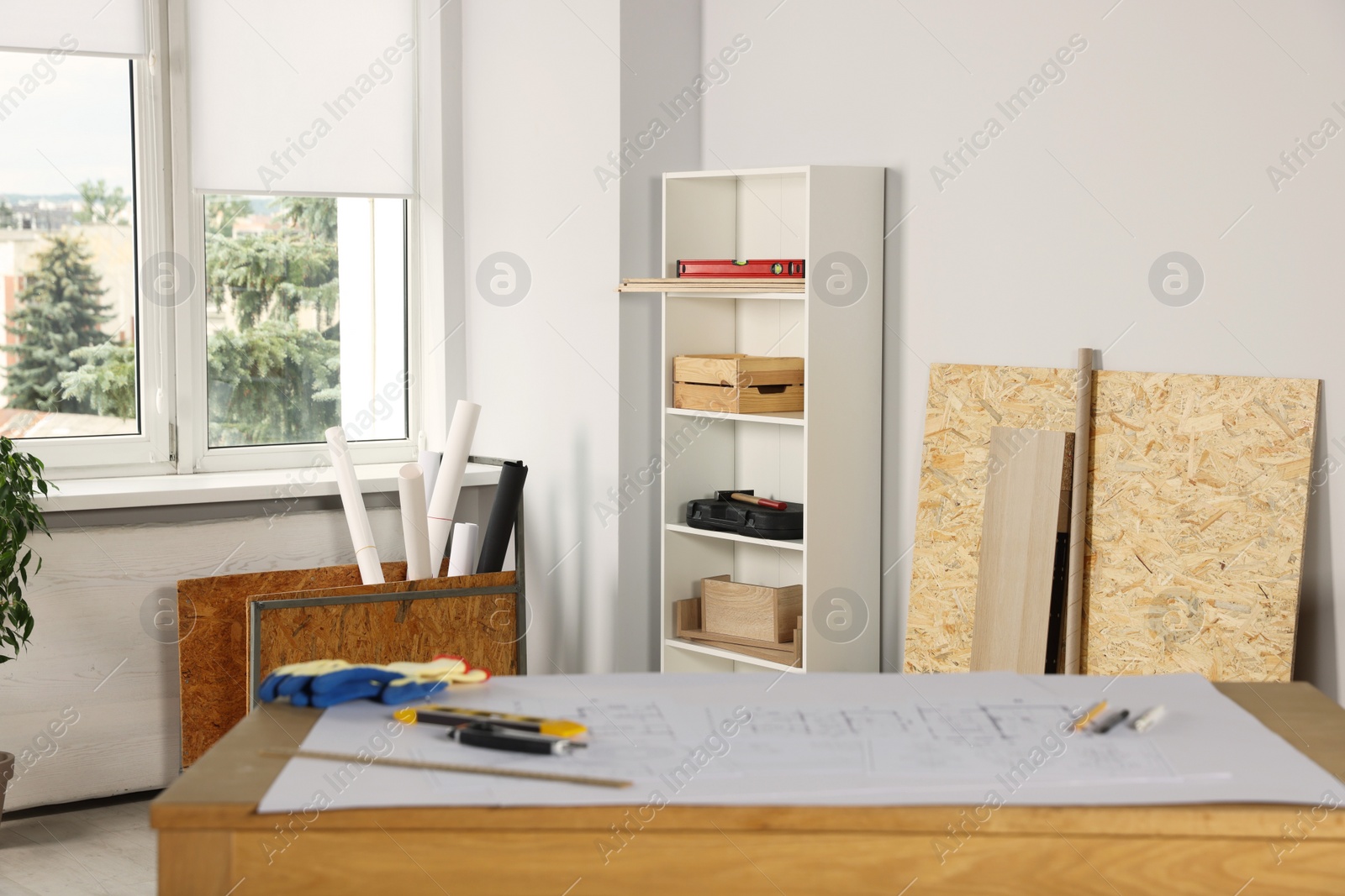 Photo of Interior of workshop with materials and window