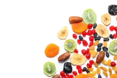 Different dried fruits on white background, top view. Healthy lifestyle