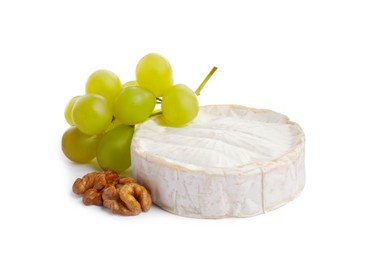 Photo of Brie cheese served with grape and walnuts isolated on white