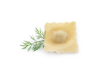 One delicious ravioli with tasty filling and dill isolated on white