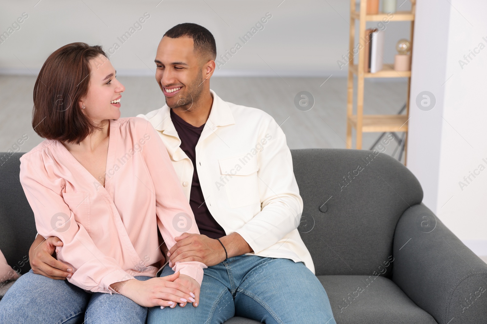 Photo of Dating agency. Happy couple enjoying time together at home