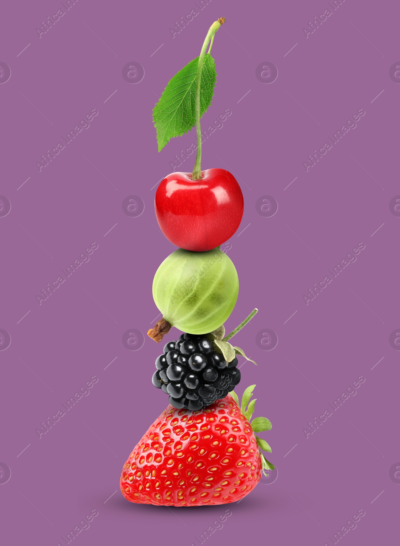 Image of Stack of different fresh tasty berries and cherry on pale purple background