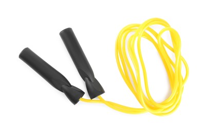 Photo of Yellow skipping rope with black handles isolated on white, top view