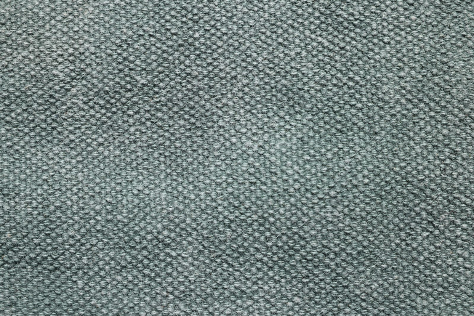 Photo of Texture of grey fabric as background, top view