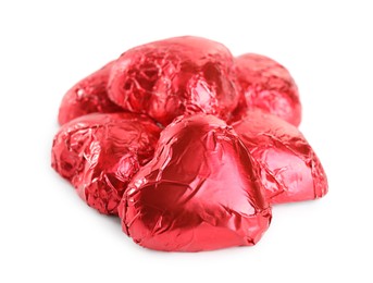 Photo of Heart shaped chocolate candies on white background