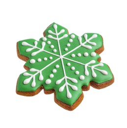 Photo of Tasty Christmas cookie in shape of snowflake isolated on white