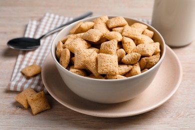 Photo of Delicious corn pads served on light wooden table