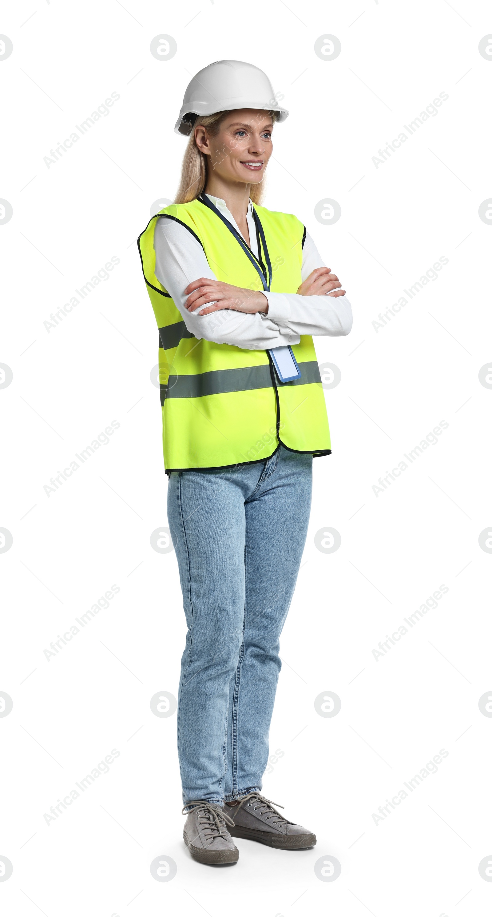 Photo of Engineer with hard hat and badge on white background